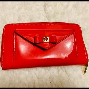 Tory Burch red bow zipped patent leather wallet